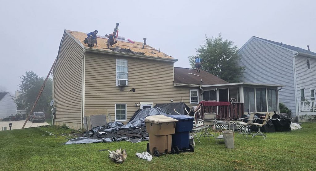 Tearing off the old roof in Newark, DE