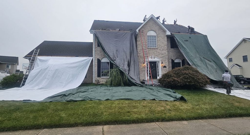 Tearing off the old roof in Bear, DE