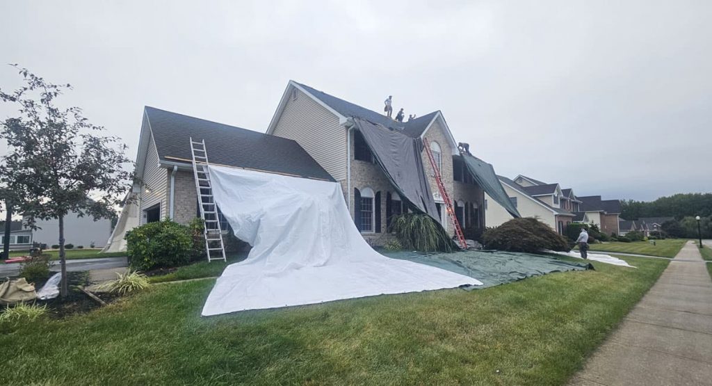 Tearing off the old roof in Bear, DE