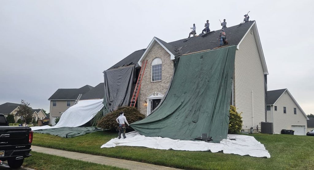 Tearing off the old roof in Bear, DE