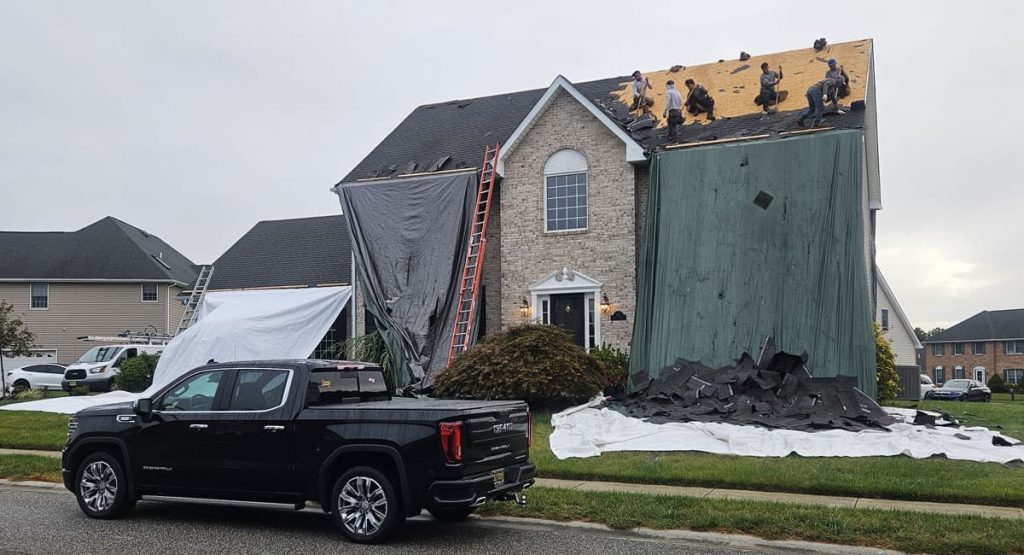 Tearing off the old roof in Bear, DE