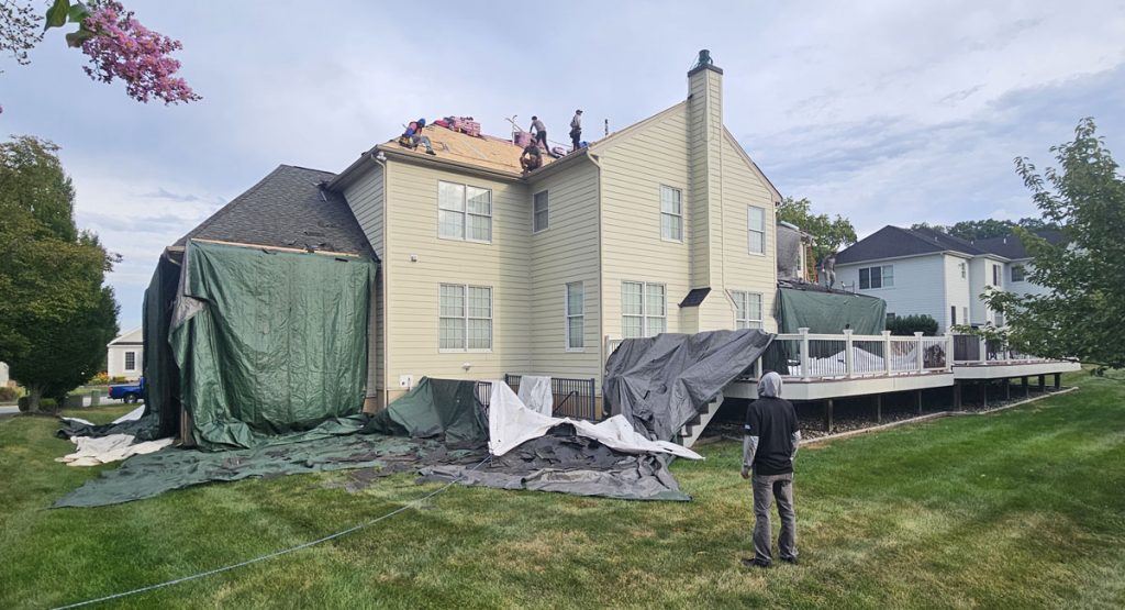 Tearing off the old roof in Wilmington, DE