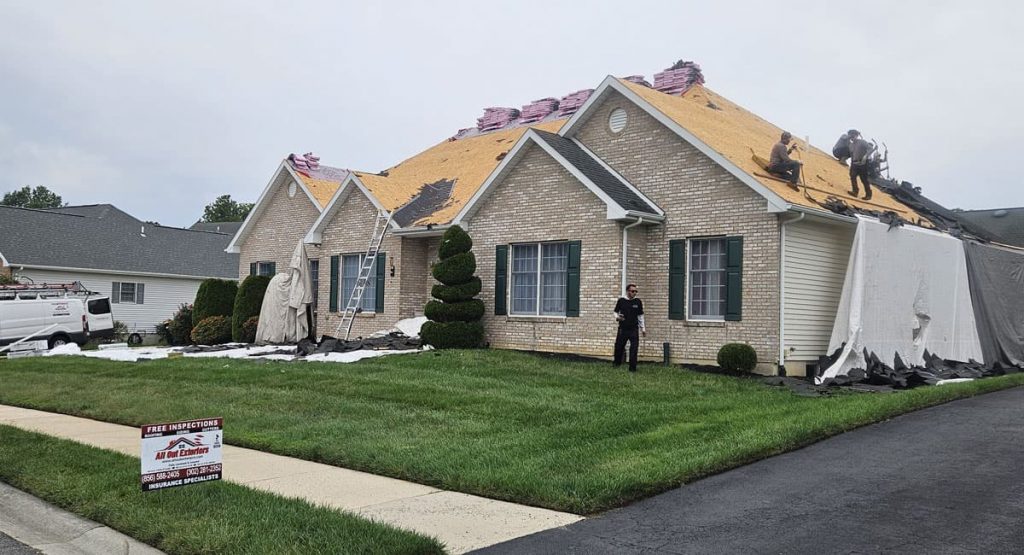 Tearing off the old roof in Bear, DE