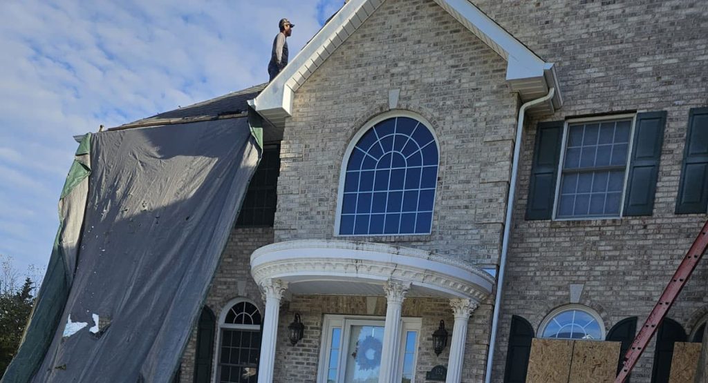 Tearing off the old roof in Bear, DE