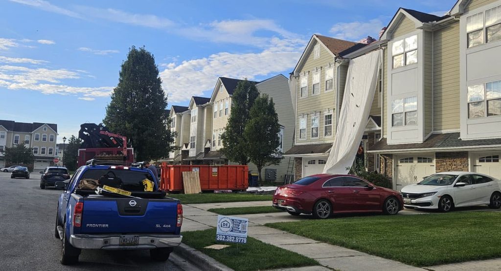 Tearing off the old roof in Dover, DE
