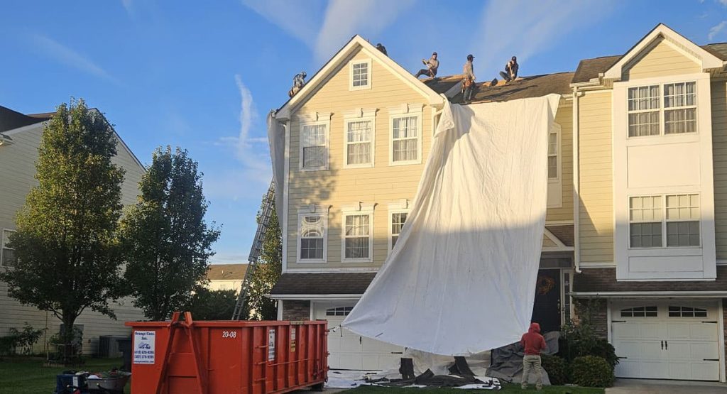 Tearing off the old roof in Dover, DE