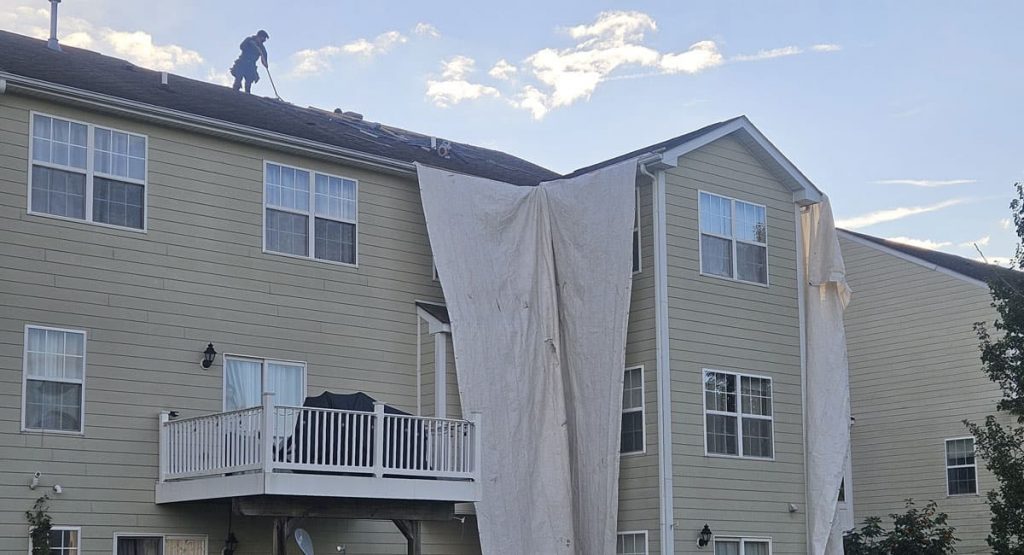 Tearing off the old roof in Dover, DE