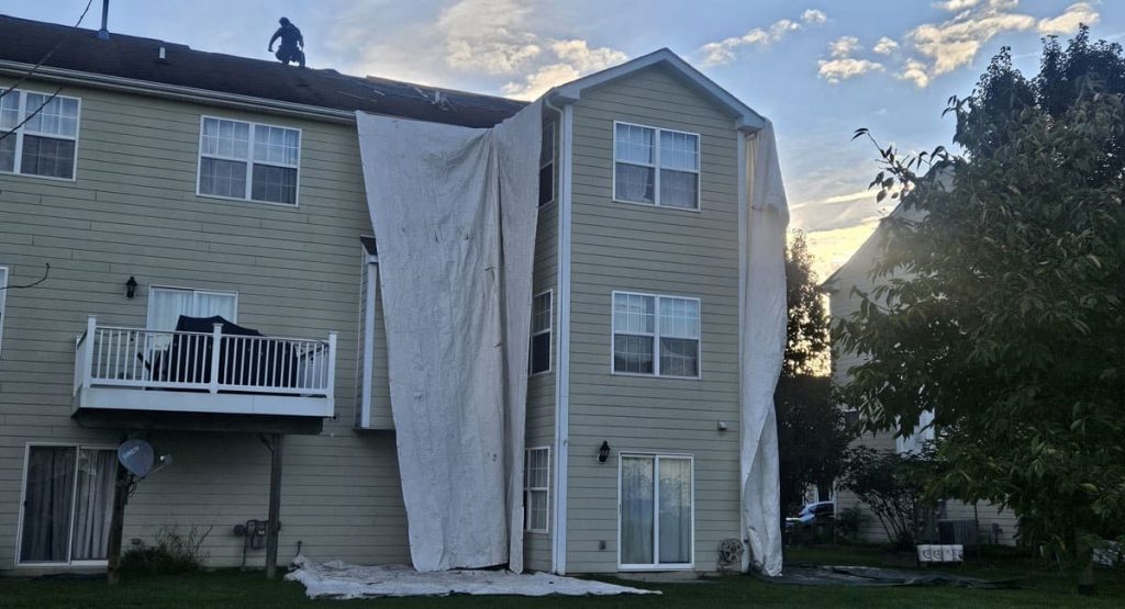 Tearing off the old roof in Dover, DE
