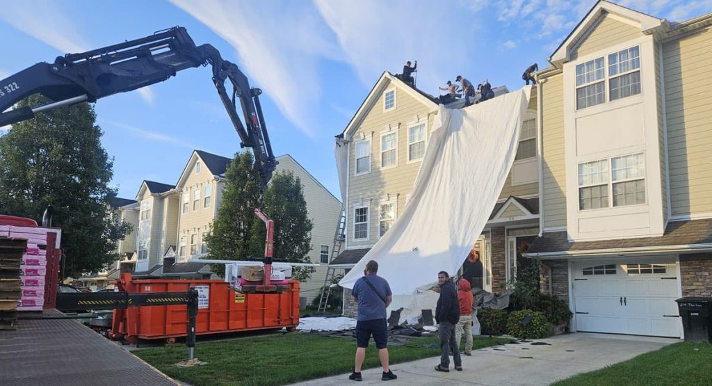 Tearing off the old roof in Dover, DE
