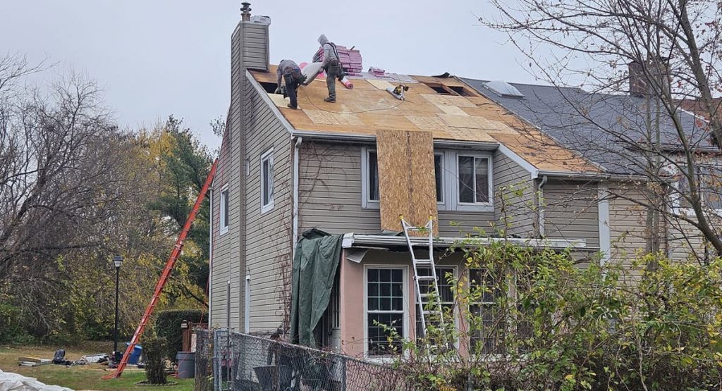 Repairing the old roof in New Castle, DE