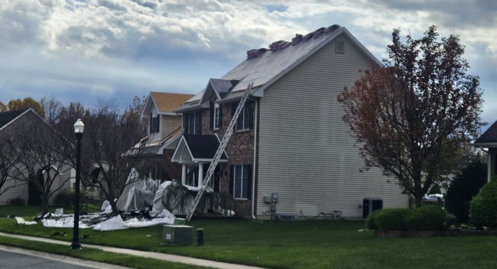 Tearing off the old roof in Bear, DE