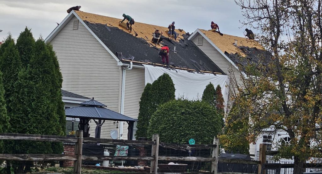 Tearing off the old roof in Bear, DE
