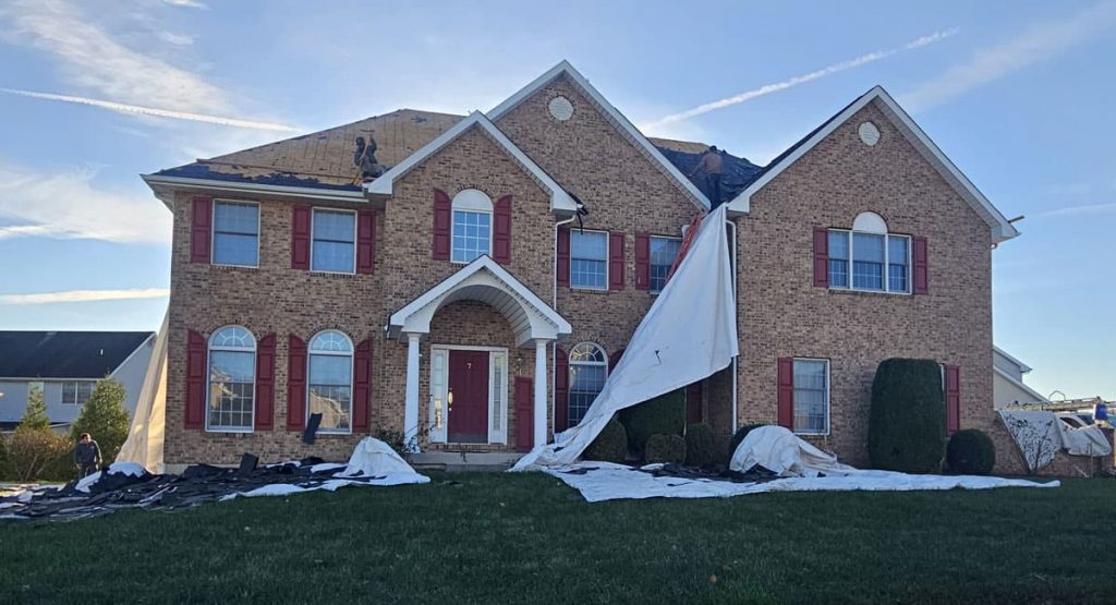 Tearing off the old roof in Bear, DE