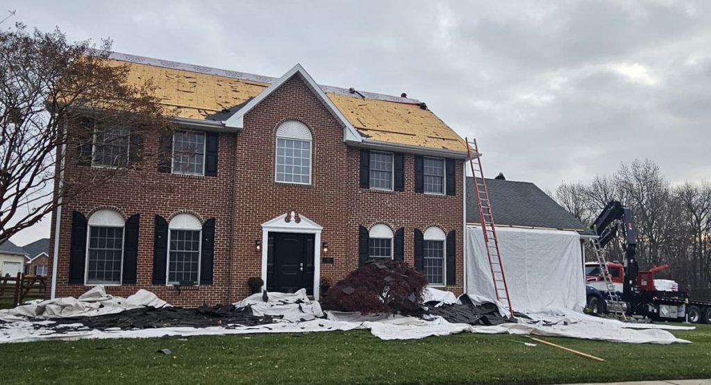 Tearing off the old roof in Bear, DE