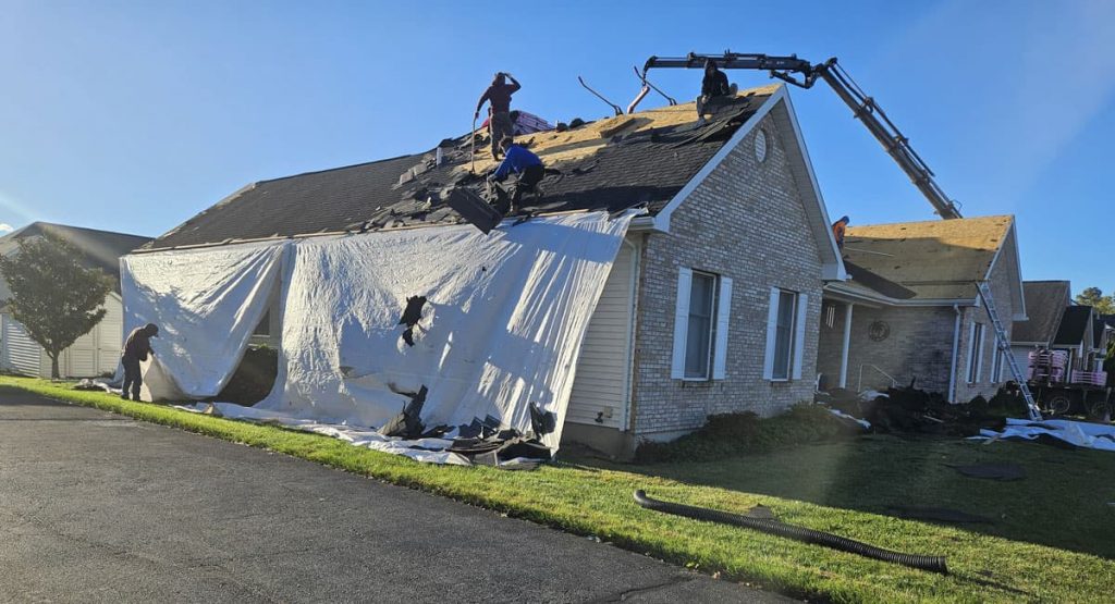 Tearing off the old roof in Bear, DE
