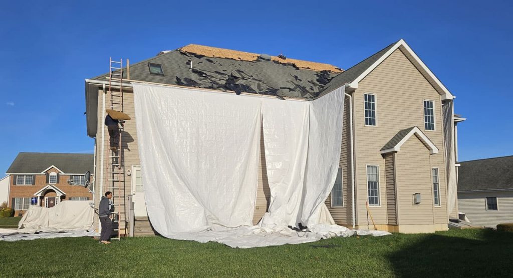 Tearing off the old roof in Bear, DE