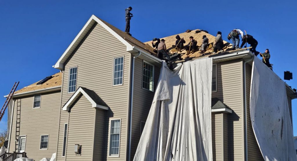 Tearing off the old roof in Bear, DE