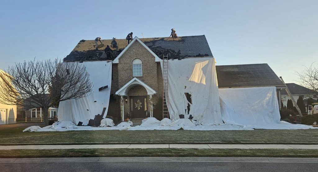 Tearing off the old roof in Bear, DE