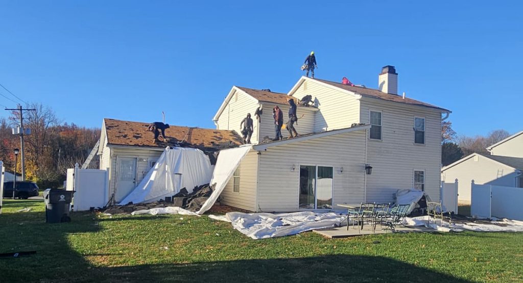 Tearing off the roof in New Castle, DE