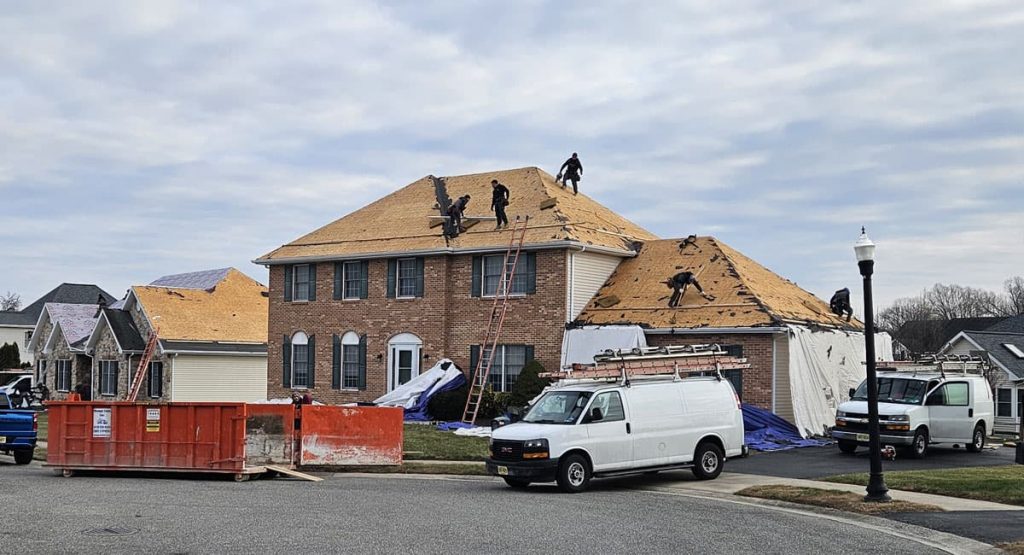 Tearing off old roof in Bear, DE