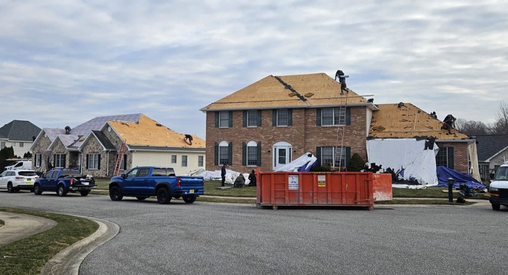 Tearing off old roof in Bear, DE