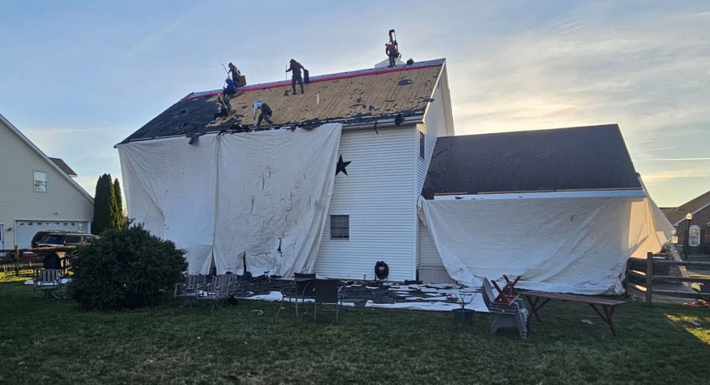 Tearing off the old roof in Bear, DE