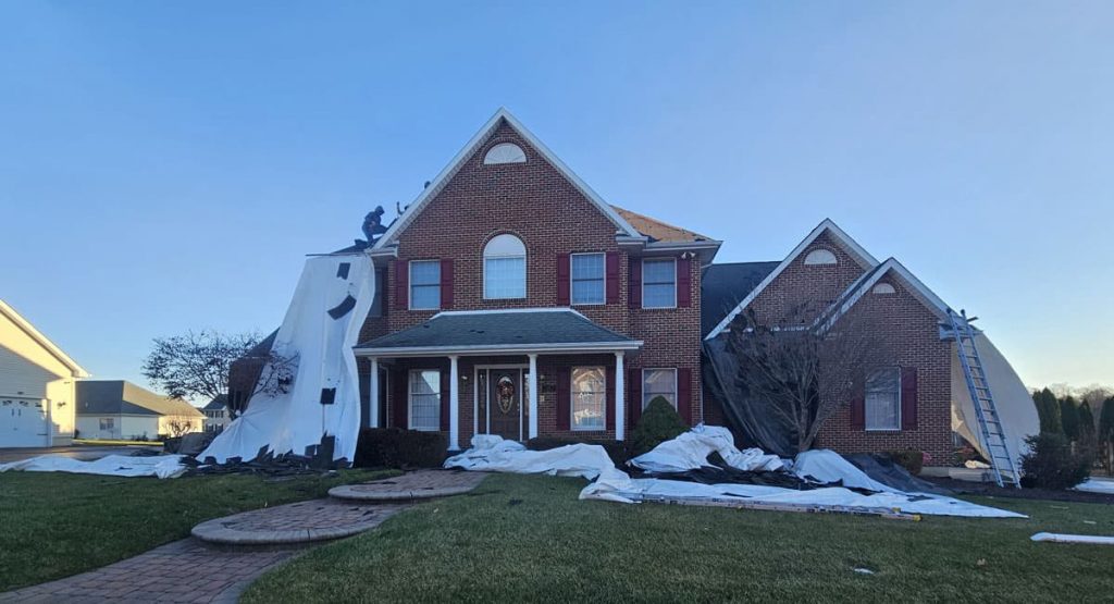 Tearing off the old roof in Bear, DE