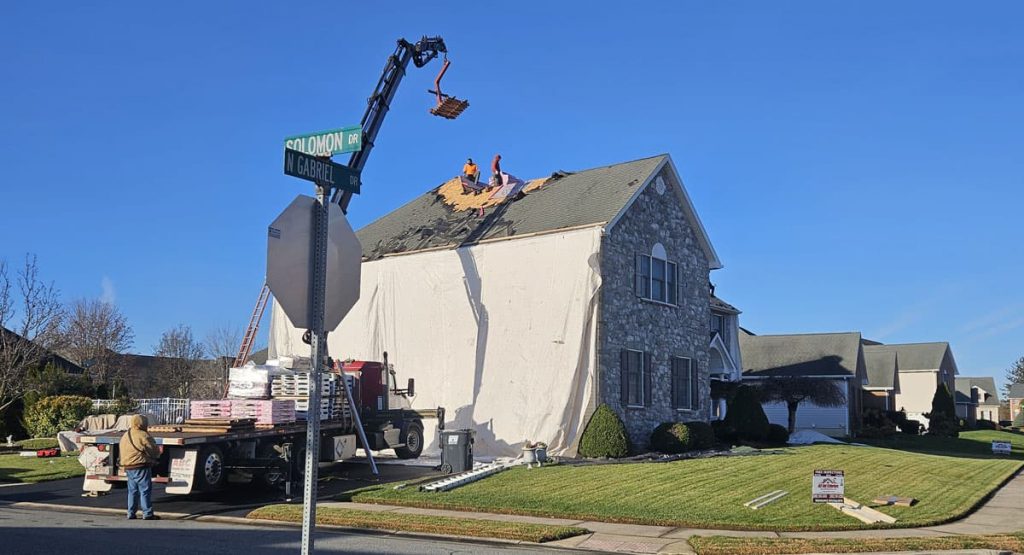 Tearing off the old roof in Bear, DE