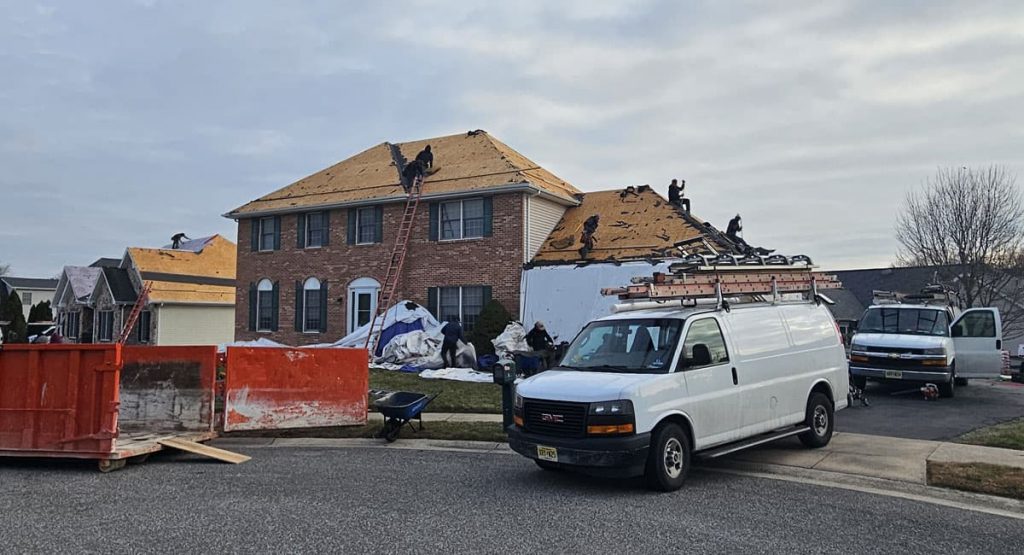Tearing off old roof in Bear, DE