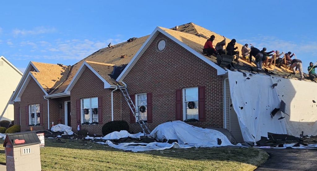 Tearing off the old roof in Bear, DE
