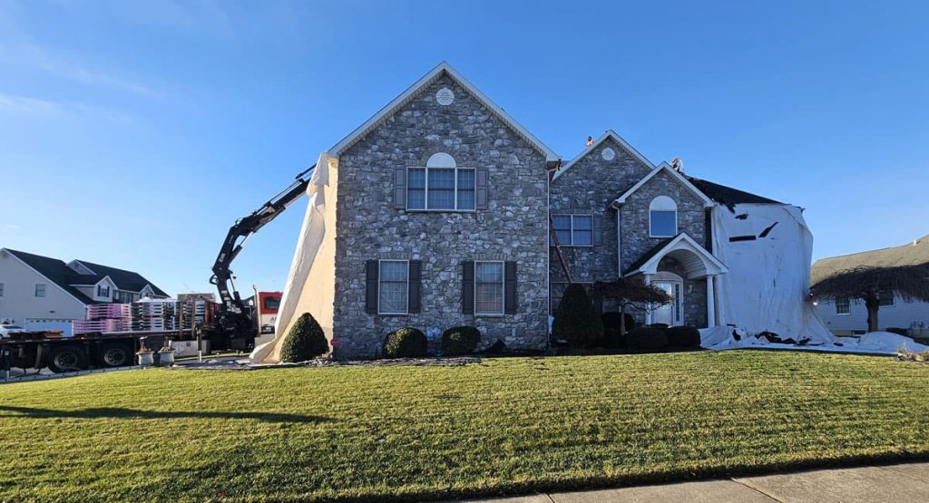 Tearing off the old roof in Bear, DE
