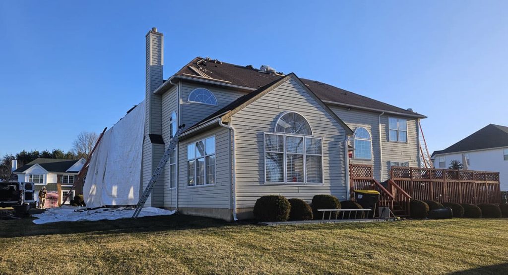 Tearing off the old roof in Bear, DE
