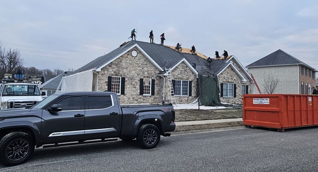 Tearing off old roof in Bear, DE
