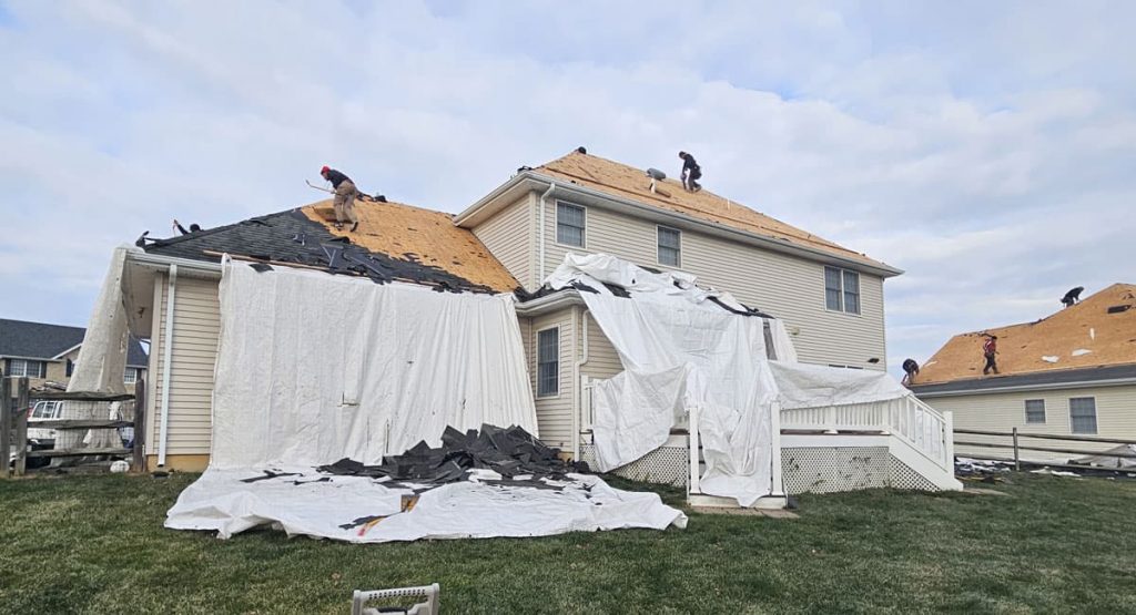 Tearing off old roof in Bear, DE