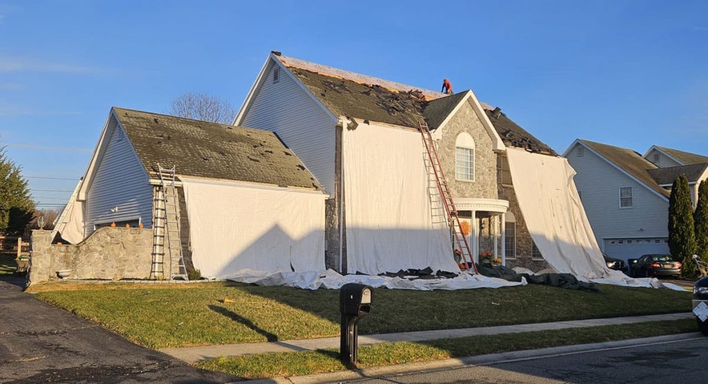 Tearing off the old roof in Bear, DE