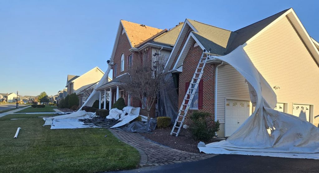 Tearing off the old roof in Bear, DE