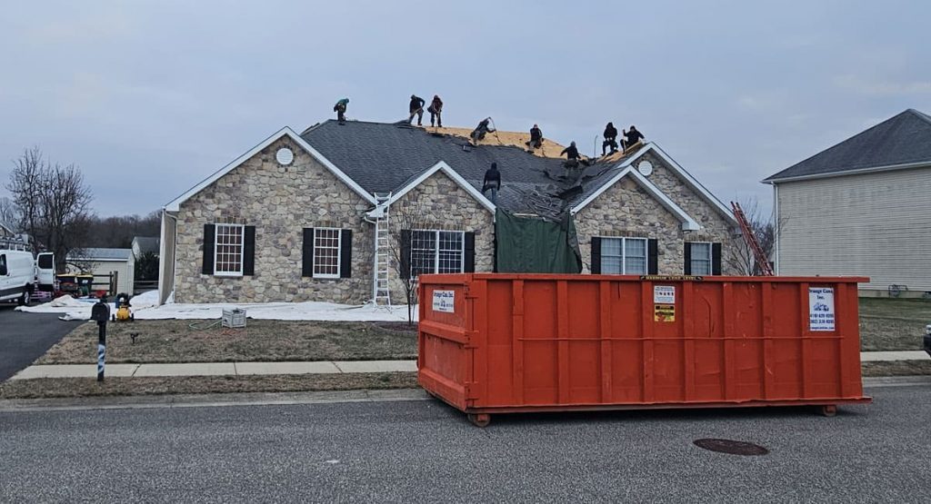 Tearing off old roof in Bear, DE