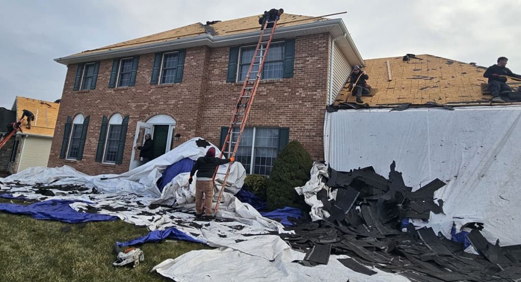 Tearing off old roof in Bear, DE