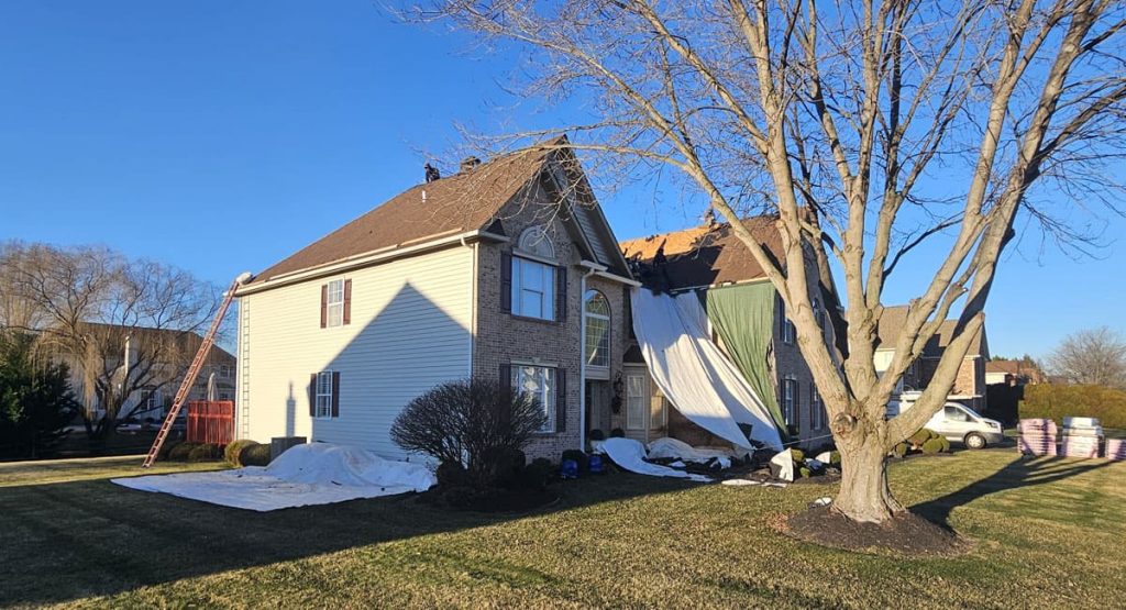Tearing off the old roof in Bear, DE