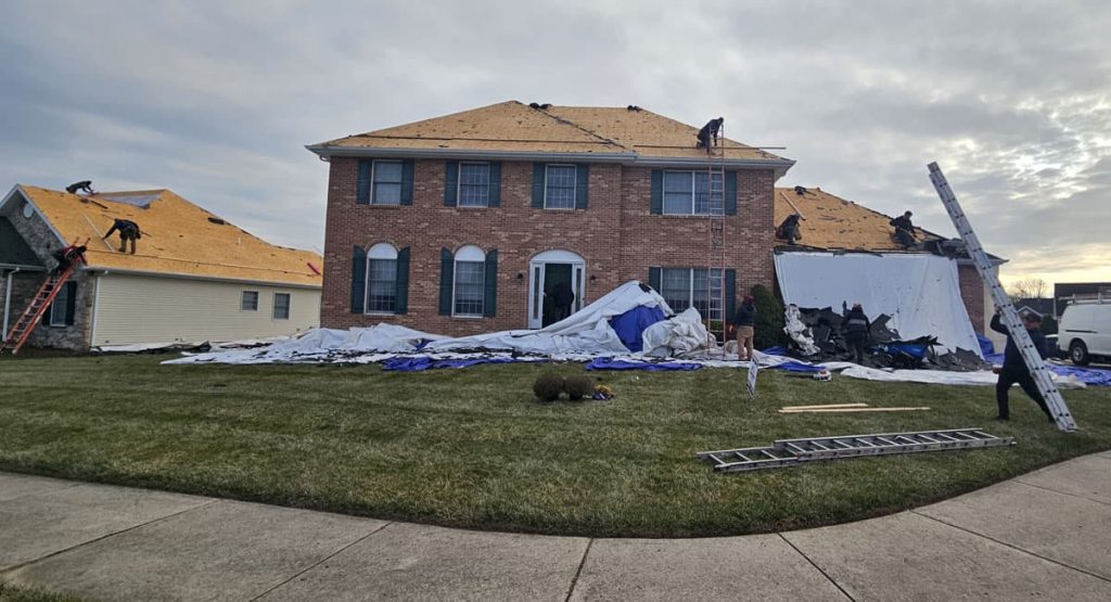 Tearing off old roof in Bear, DE