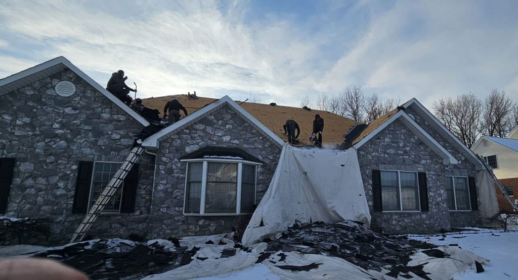 Tearing off the old roof in Bear, DE
