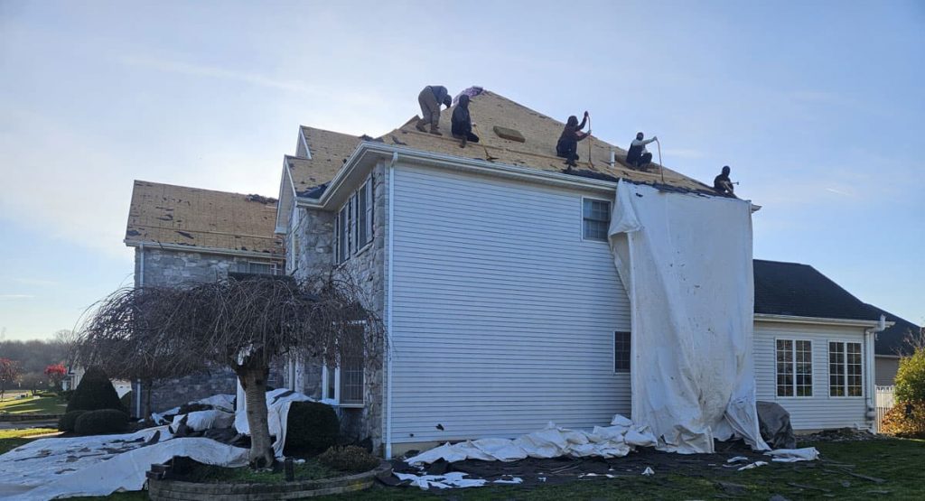 Tearing off the old roof in Bear, DE