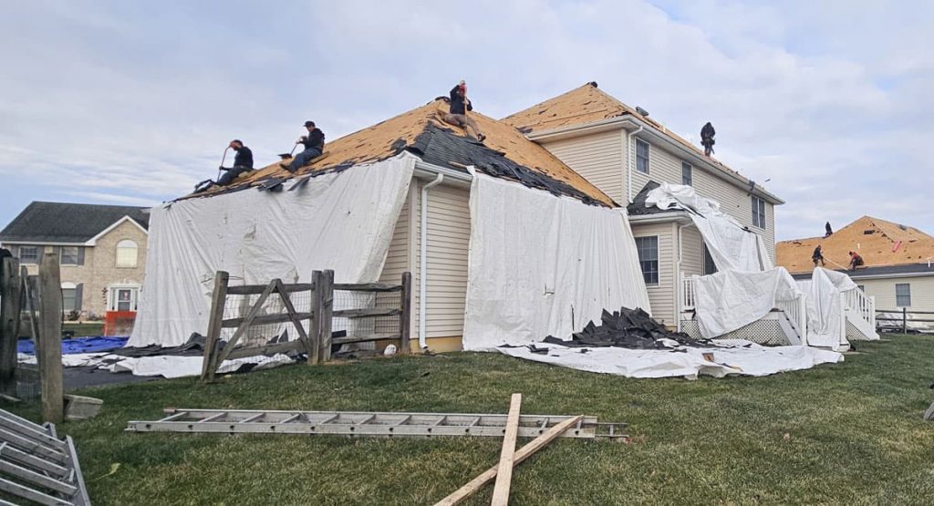Tearing off old roof in Bear, DE