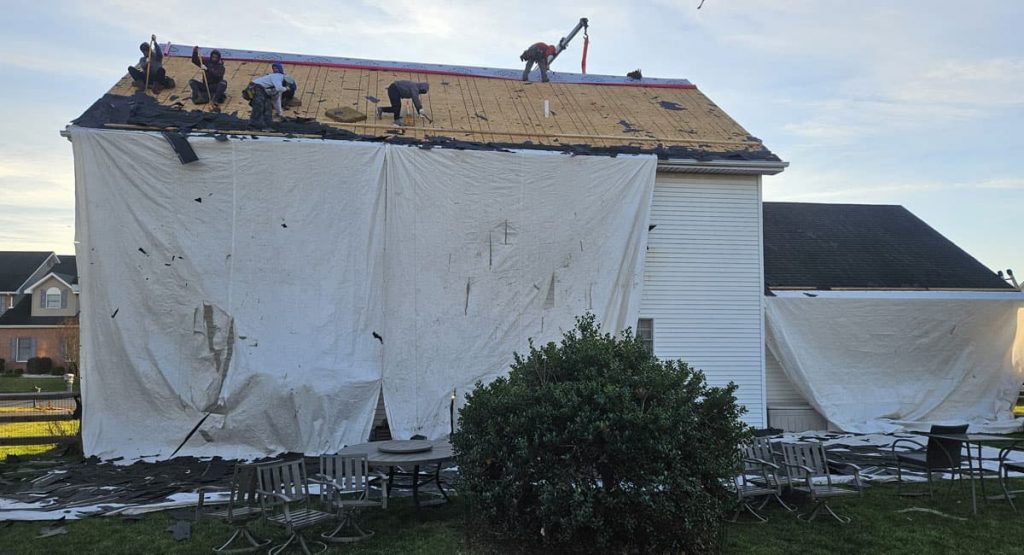 Tearing off the old roof in Bear, DE