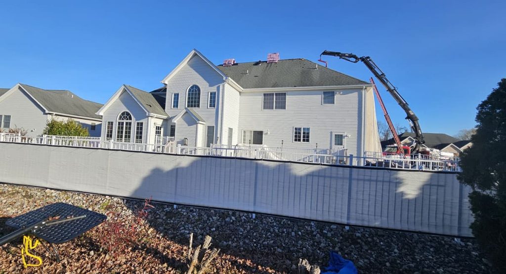 Tearing off the old roof in Bear, DE