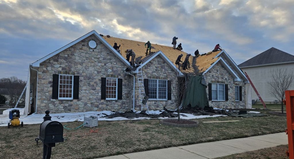Tearing off old roof in Bear, DE