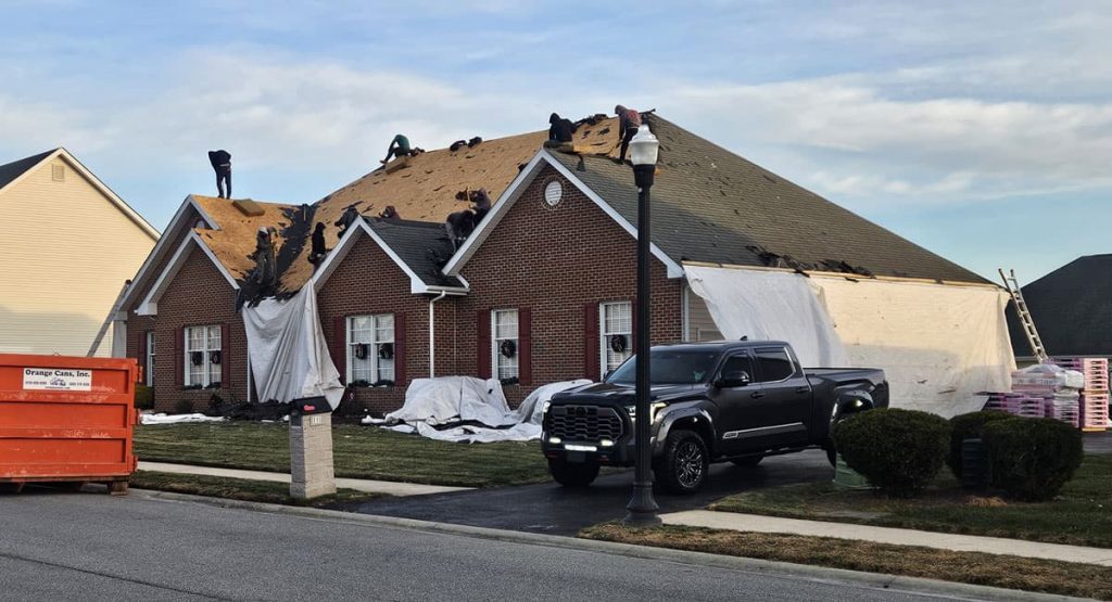 Tearing off the old roof in Bear, DE