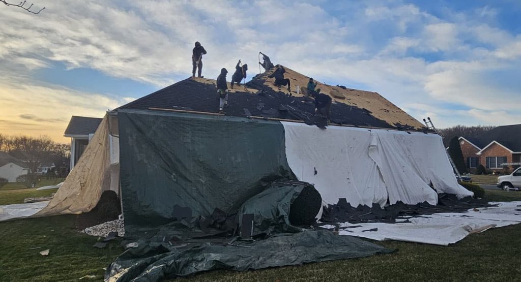Tearing off the old roof in Bear, DE