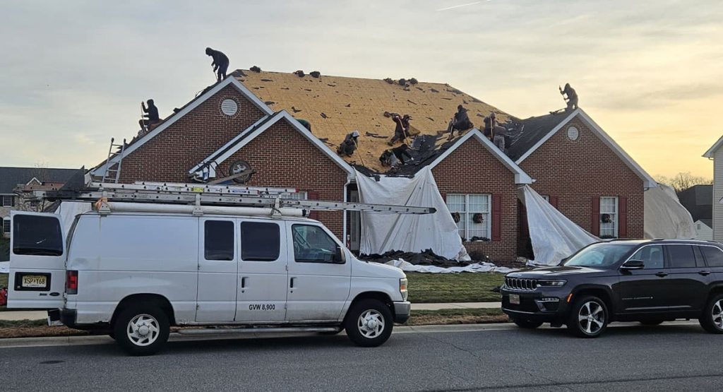 Tearing off the old roof in Bear, DE