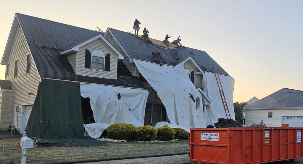 Tearing off old roof in Bear, DE